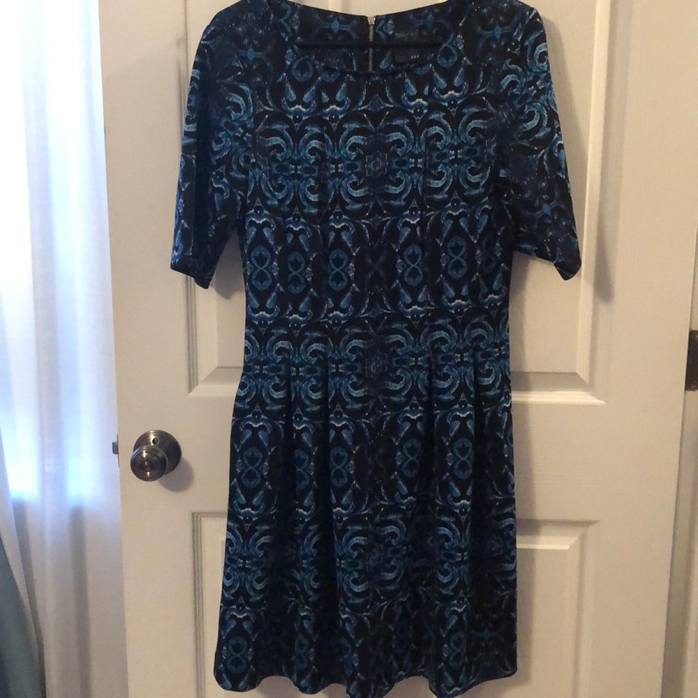 Black and blue pleated dress